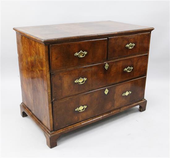 A George I crossbanded walnut chest, W.3ft 8in. D.2ft 1in. H.2ft 1in.